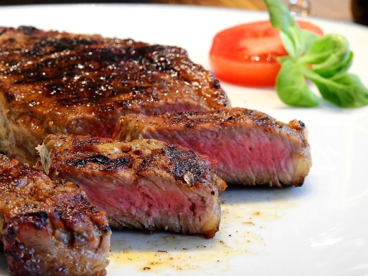 A steak upon a white plate